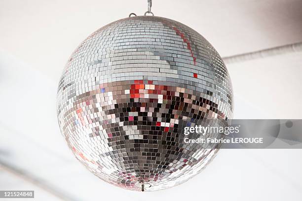 low angle view of a mirrored disco ball in a nightclub - suspended ceiling stock pictures, royalty-free photos & images