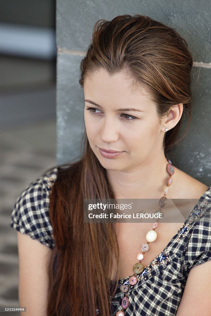 Close-up of a woman day dreaming