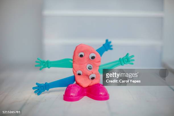 clay monster with google eyes - paper sculpture stock pictures, royalty-free photos & images