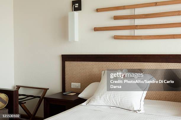 empty hotel room - headboard stock pictures, royalty-free photos & images