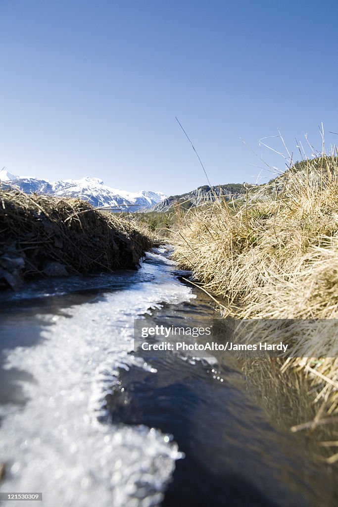 Ice flowing on river