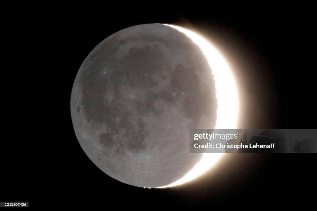 A 3 Days Old Crescent Moon And Its Ash Light High Res Stock Photo a-3-days-old-crescent-moon-and-its-ash-light-high-res-stock-photo