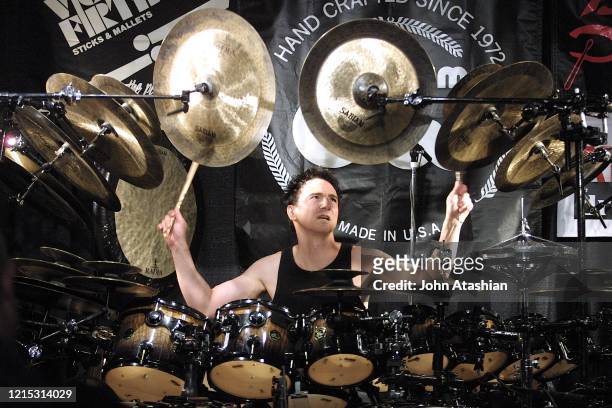 Percussionist Terry Bozzio is shown playing during a drumming clinic on November 4, 2002.