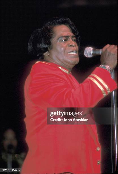 "The Godfather of Soul", the "King of Funk", and "The Hardest Working Man in Show Business", James Brown is shown performing on stage during a live...