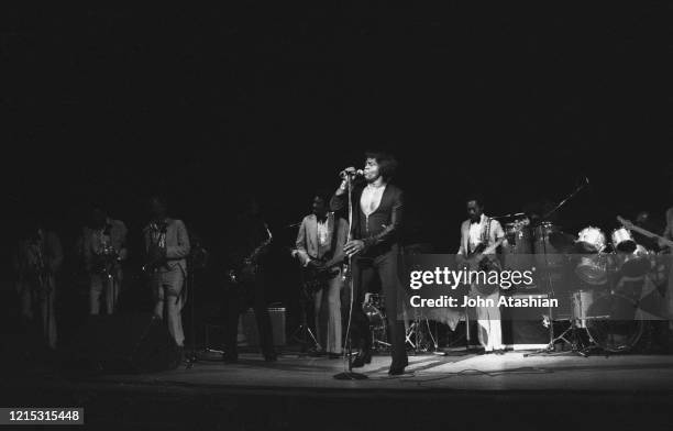 Singer James Brown is shown performing on stage during a live concert appearance on September 20, 1985.