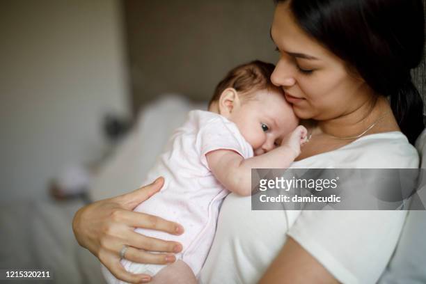 mother and baby at home - baby stock pictures, royalty-free photos & images