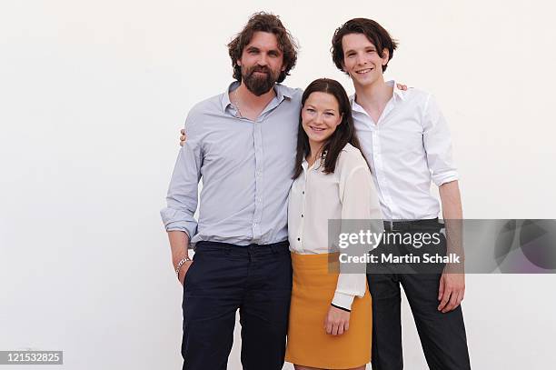 Sebastian Schipper, Hannah Herzsprung and Sabin Tambrea attend the photocall for the Ludwig II movie at Castle Hof on August 20, 2011 in Hof near...