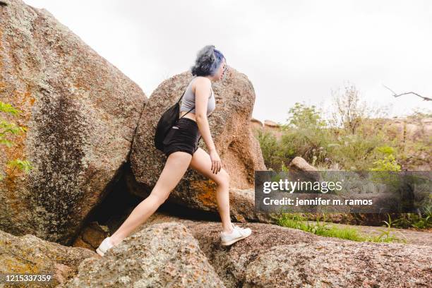enchanted rock state natural area texas teenage girl hiking - fredericksburg stock pictures, royalty-free photos & images