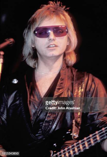 Bassist Benjamin Orr is shown performing on stage during a live concert appearance with The Cars on November 19, 1987.