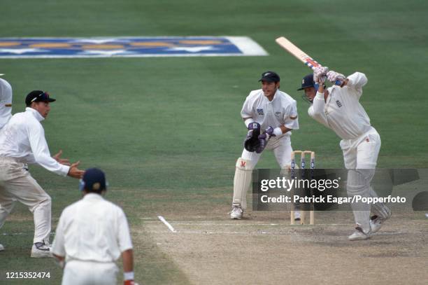 England captain Mike Atherton drives past New Zealand captain Stephen Fleming during his innins of 118 in the 3rd Test match between New Zealand and...