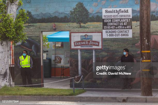 The Farmer John slaughterhouse is seen after 153 workers tested positive for COVID-19, on May 26, 2020 in Vernon, California. Los Angeles County...