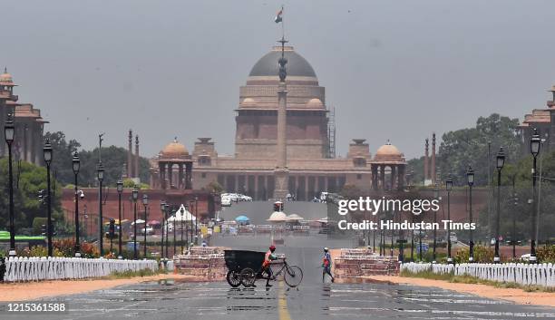 Mirage forms along Rajpath with Rashtrapati Bhawan in the background as temperature soars on a hot summer day, on May 26, 2020 in New Delhi, India.