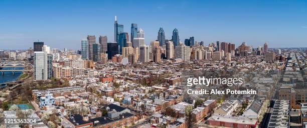 panoramic aerial view on philadelphia downtown over residential district in a sunny day. - philadelphia pennsylvania stock pictures, royalty-free photos & images