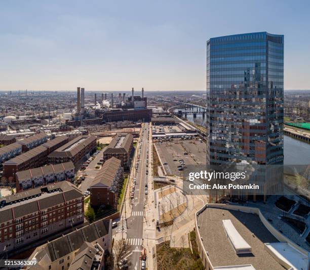 corporate building in philadelphia in front of the industrial district. - alex potemkin coronavirus stock pictures, royalty-free photos & images