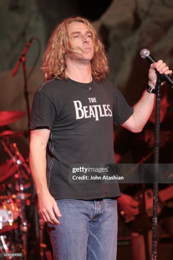 Ed Roland Images Singer Ed Roland is shown performing on stage during a live concert ...