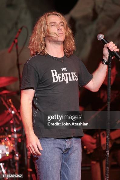 Ed Roland Father Singer Ed Roland is shown performing on stage during a live concert ...