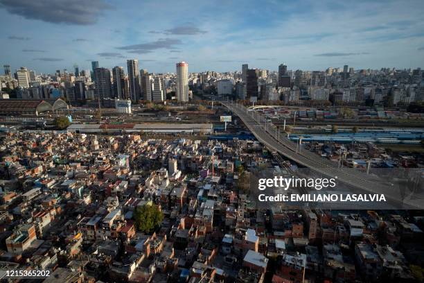 Aerial view of Villa 31, one of the largest slums in Buenos Aires, taken on May 23, 2020 during the COVID-19 novel coronavirus pandemic. Overcrowded...