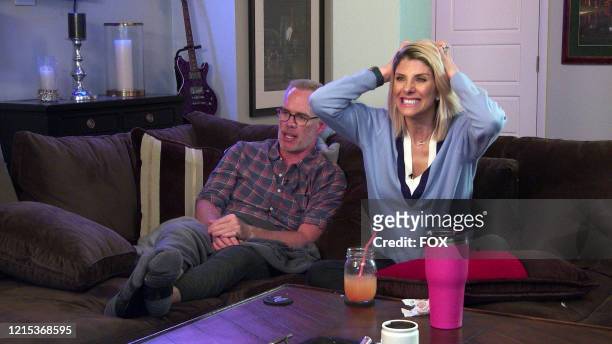 Joe Buck and Michelle Beisner-Buck in the The Watch Party Has Begun" series premiere episode of CELEBRITY WATCH PARTY airing Thursday, May 7 on FOX.