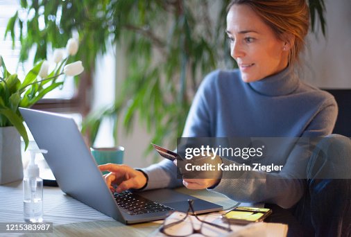 Woman using credit card for online shopping Woman using credit card for online shopping