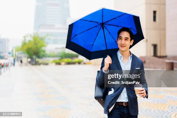 it's raining a little bit today - eurasian ethnicity stock pictures, royalty-free photos & images