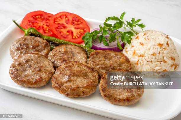 grilled meatballs with pilau rice - turkey meat balls stock pictures, royalty-free photos & images