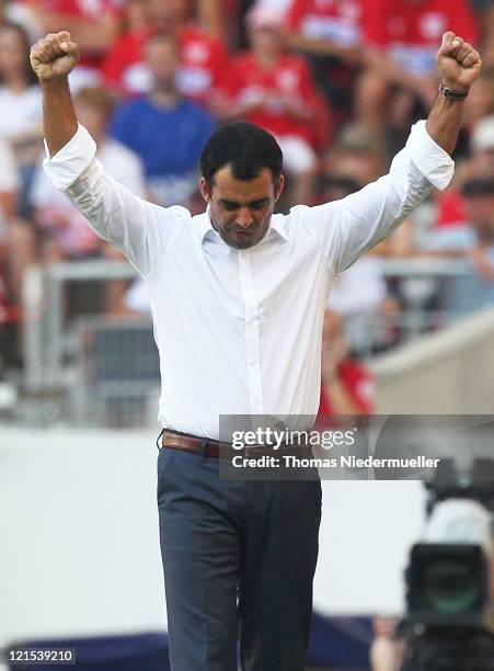 Head coach Robin Dutt of Leverkusen celebrates after the Bundesliga match between VfB Stuttgart and Bayer 04 Leverkusen at Mercedes-Benz Arena on...