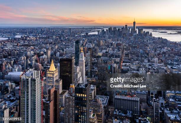 high angle sunset midtown skyline view - new york - union square new york city stock pictures, royalty-free photos & images