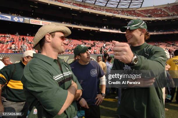 Christopher Meloni and Jason Biggs speak with New York Jets Quarterback Chad Pennington when they attend the New York Jets vs San Diego Chargers game...