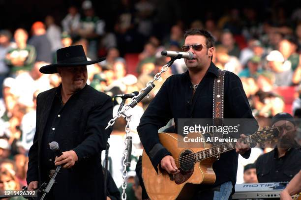 Eddie Montgomery, Troy Gentry and Montgomery Gentry perform at Halftime of the New York Jets vs San Diego Chargers game at The Meadowlands on...