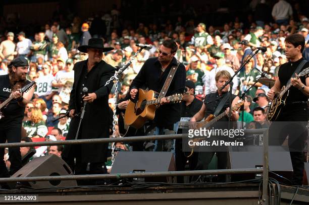 Eddie Montgomery, Troy Gentry and Montgomery Gentry perform at Halftime of the New York Jets vs San Diego Chargers game at The Meadowlands on...