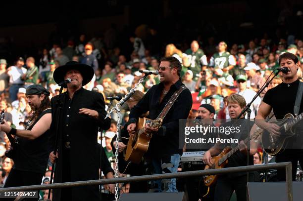 Eddie Montgomery, Troy Gentry and Montgomery Gentry perform at Halftime of the New York Jets vs San Diego Chargers game at The Meadowlands on...