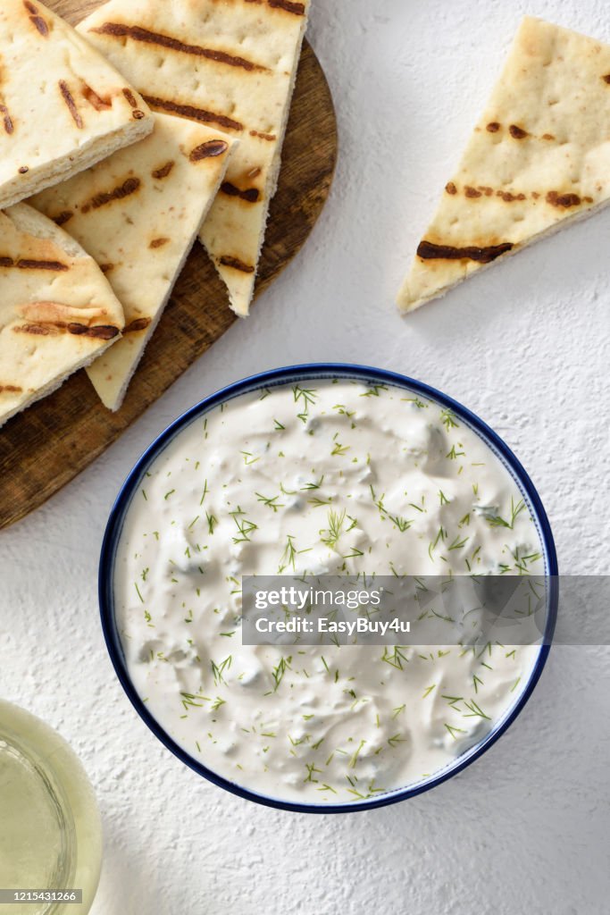Tzatziki dip and pita bread chips