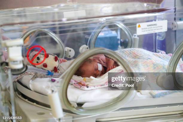 Image released on May 27, A newborn baby in the maternity ward at Frimley Park Hospital in Surrey on May 22, 2020 in Frimley, United Kingdom. The...