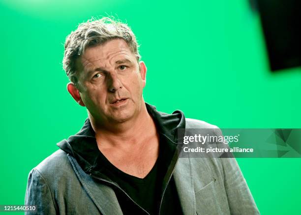 The actor Hans Sigl is in front of the camera during the shooting of a short film for the UNHCR . The German version of the poem "What They Took With...