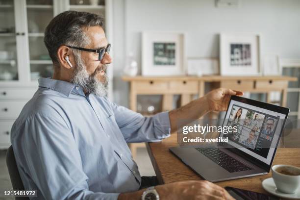 working during isolation period - social distancing meeting stock pictures, royalty-free photos & images