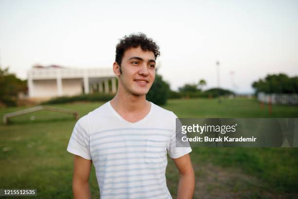 portrait of teenager boy - turkish boy stockfoto's en -beelden