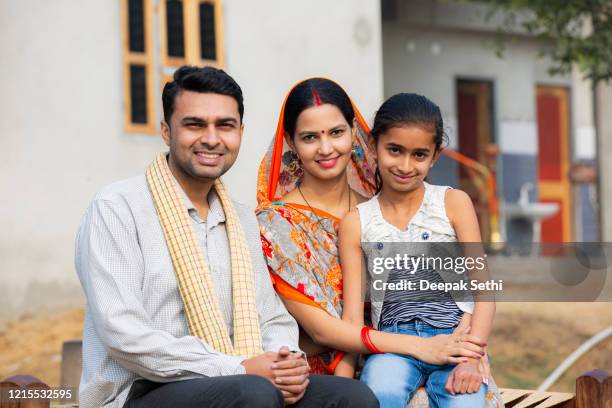 rural indian family at village stock photo - rural indian family stock pictures, royalty-free photos & images