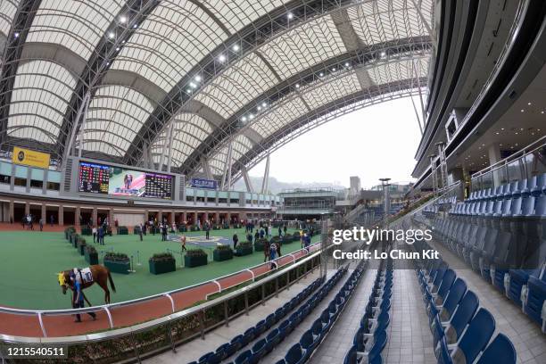 March 29 : The empty stand surrounding the parade ring prior to the Race 1 Un Chau Handicap at Sha Tin Racecourse on March 29, 2020 in Hong Kong....