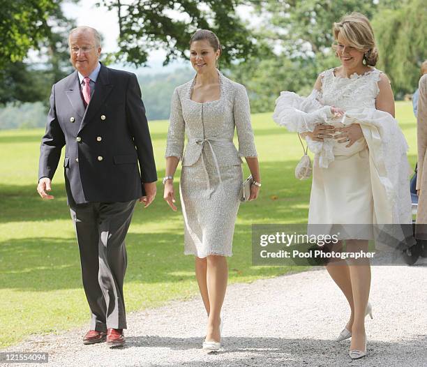 King Albert of Belgium, Princess Victoria of Sweden and Princess Mathilde of Belgium carrying Princess Eleonore of Belgium arrive for the baptism of...