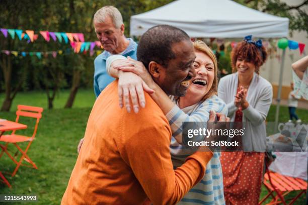 just a bit of fun - dancing outside stock pictures, royalty-free photos & images