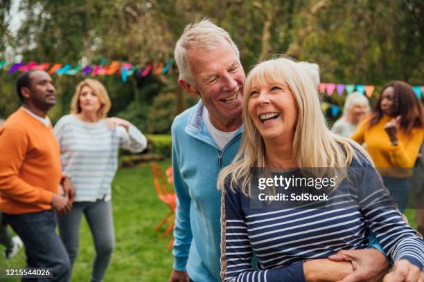 cuddles in the garden - fall afternoon tea party stock pictures, royalty-free photos & images