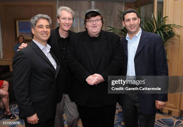 Overture Films COO Danny Rosett, Overture Films CEO Chris McGurk, Director Michael Moore and Paramount Vantage President Nick Meyer attend the...