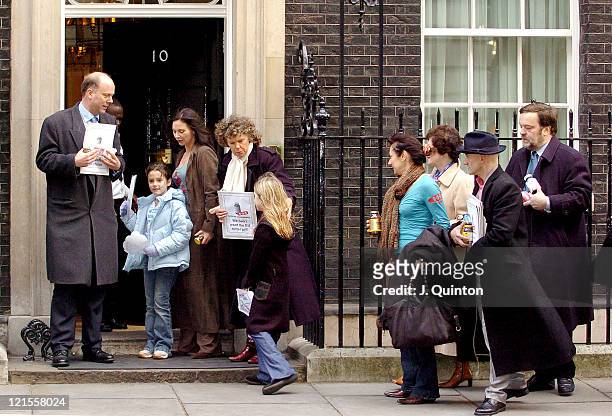 Carole Caplin with young protestors and Tory MP Chris Grayling deliver a protest letter to Tony Blair over a European Union directive intending to...