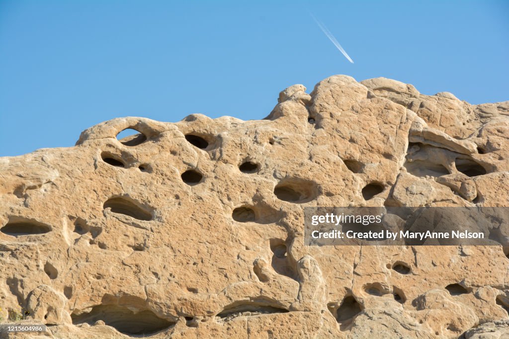 Large Rock with Holes and Small Arch