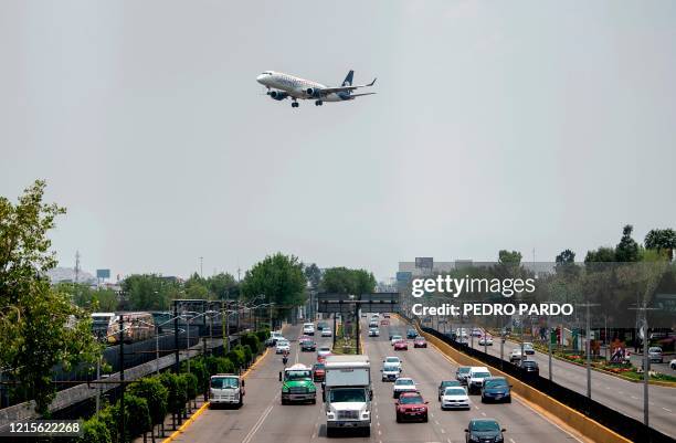 An Aeromexico airlines plane lands at the Benito Juarez International airport, in Mexico City, on May 20 amid the new Covid-19 coronavirus pandemic....