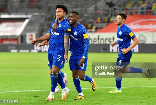 Weston McKennie of FC Schalke 04 celebrates with Rabbi Matondo after scoring his team's first goal during the Bundesliga match between Fortuna...