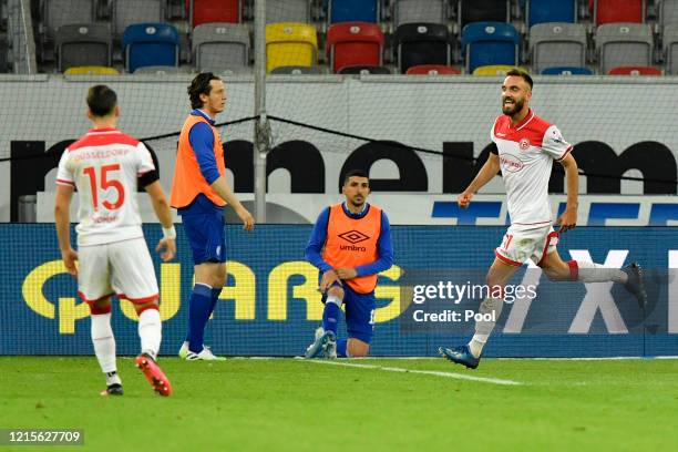 Kenan Karaman of Fortuna Duesseldorf celebrates after scoring his team's second goal during the Bundesliga match between Fortuna Duesseldorf and FC...