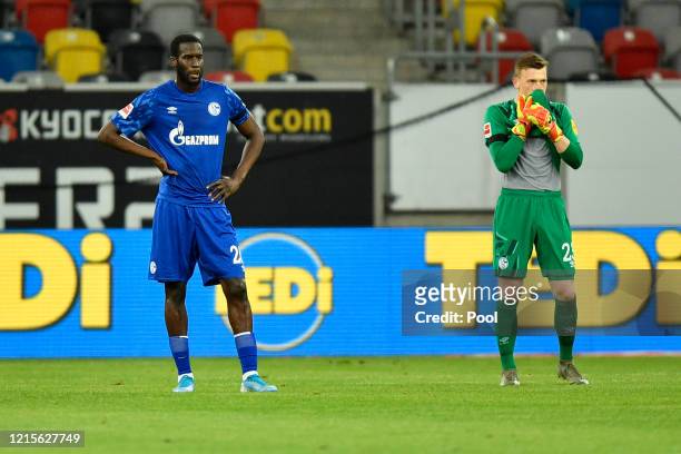 Salif Sane and Markus Schubert of FC Schalke 04 react to their side conceding there second goal during the Bundesliga match between Fortuna...
