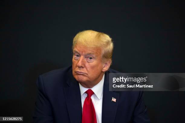 President Donald Trump participates in a press conference at the Kennedy Space Center on May 27, 2020 in Cape Canaveral, Florida. NASA astronauts Bob...