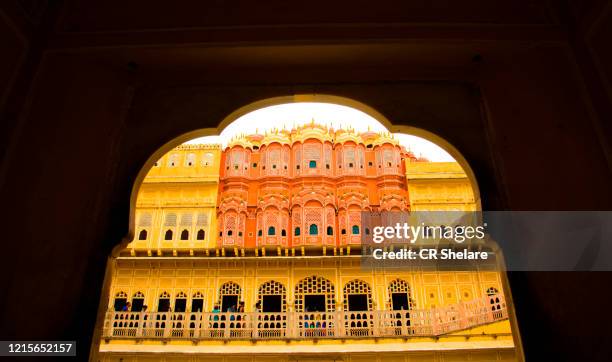 hawa mahal, also known as the palace of the winds, in the pink city of jaipur in rajasthan - tribal art stock pictures, royalty-free photos & images